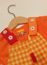 Load image into Gallery viewer, Dungaree in orange plaid pattern with pockets
