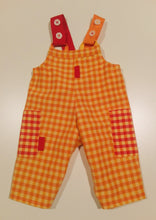 Load image into Gallery viewer, Dungaree in orange plaid pattern with pockets