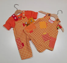 Load image into Gallery viewer, Dungaree in orange plaid pattern with pockets