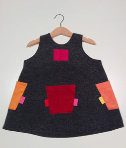 Trapeze Dress in wool with colorful pockets