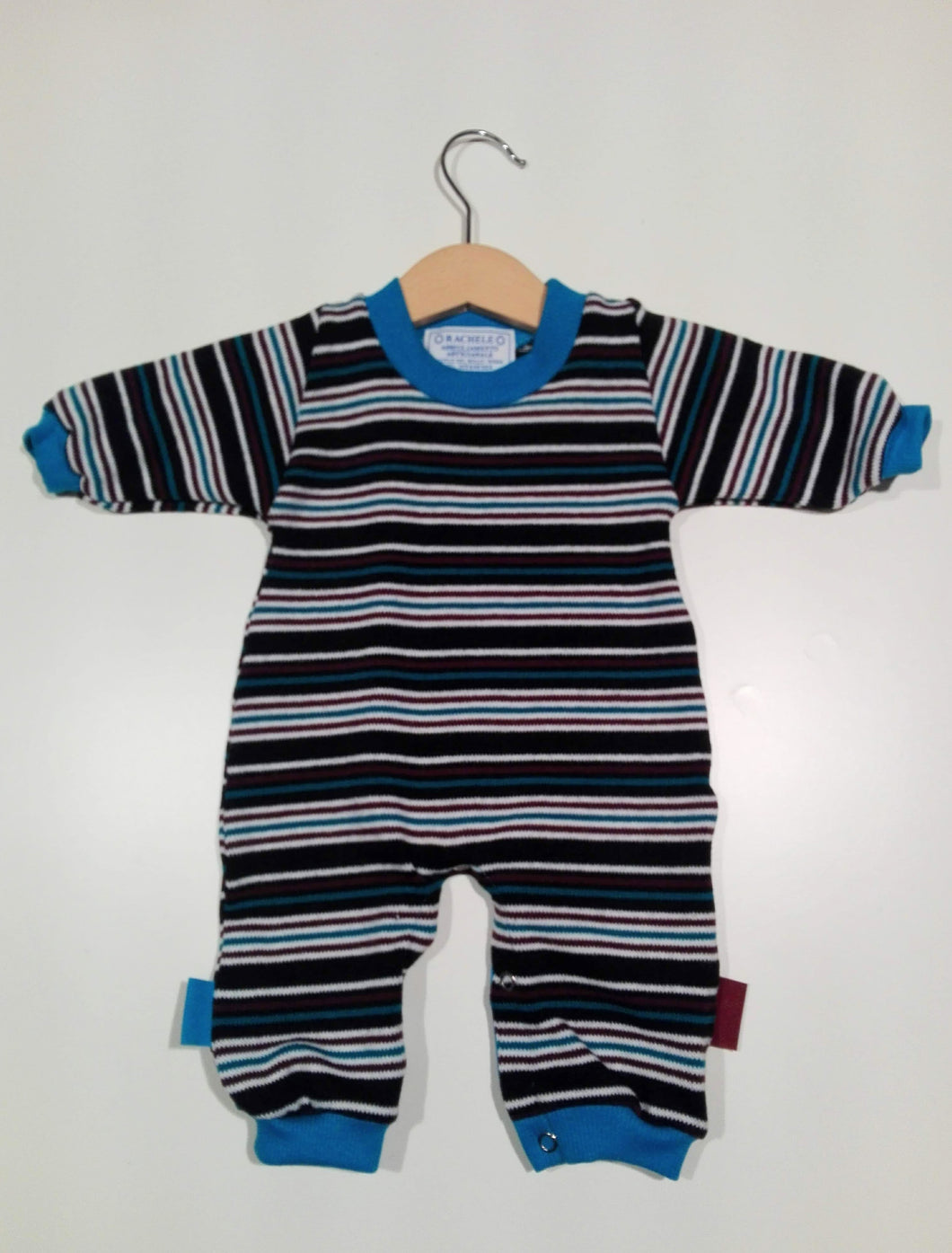 Onesie in wool with cuffs in cotton