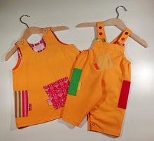 Load image into Gallery viewer, Dungaree in orange with pockets and patches
