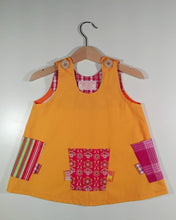 Load image into Gallery viewer, Trapeze Dress in cotton orange with colored patches
